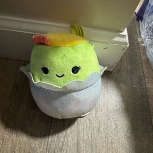 Squishmallows rainbow logo fabric tag - multicolor letters on white